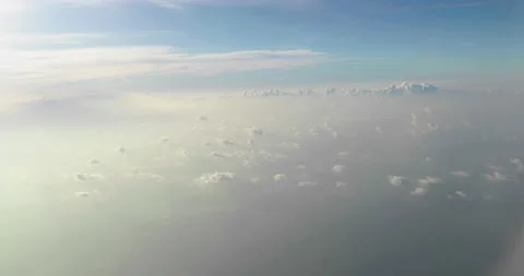 Amazing shot of fluffy clouds from an airplane window Stock-Footage 238485280