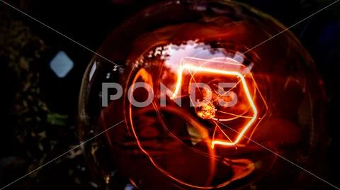 Amazing shot of lightning red lamp with reflection and shadows. Stock Photos