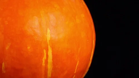 Amazing side of orange pumpkin close up, rotating contra clockwise Stock Footage 77716868