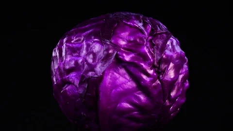 Amazing side view of whole red cabbage head close up, rotating contra clockwise Video stock 78382926
