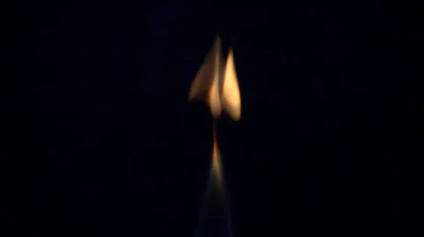 Amazing single pulsing flame, isolated on black background. Stock Footage 48788048