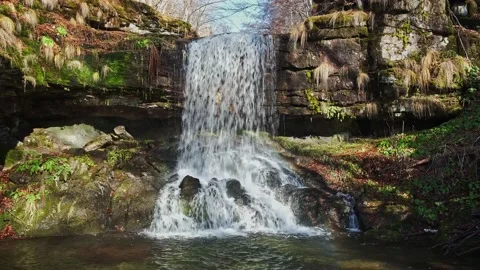 Amazing Skok waterfall cascading down the colorful, sunlit cliff Video stock 151990631
