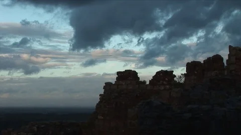Amazing sky as clouds move over castle in the evening sky emotive 库存影片 70715976