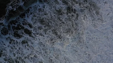 Amazing Slow Motion Waves shot at 120fps top down angle with the DJI Mavic Stock Footage 103219115