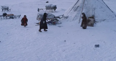 Amazing small children playing together in the middle of Arctic in a yurts camp Stock Footage 112669801
