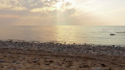 Amazing sunrise or sunset with reflection on water, sun lights Stock Footage 128515629