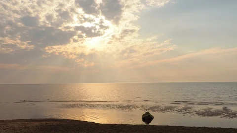 Amazing sunrise or sunset with reflection on water, sun lights Stock Footage 128524567