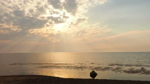 Amazing sunrise or sunset with reflection on water, sun lights Stock Footage 131119024