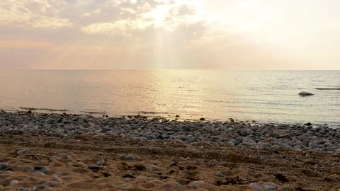 Amazing sunrise or sunset with reflection on water, sun lights Stock Footage 131119624