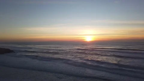 Amazing sunset in a beach with the ocean in background. Stock Footage 134836725