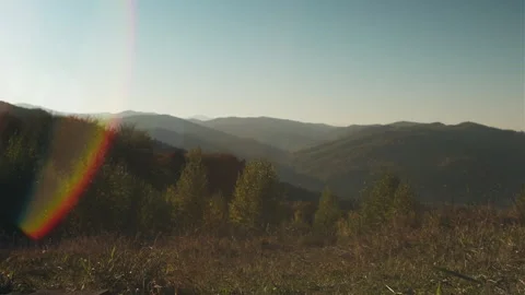Amazing sunset in beautiful mountains, sky and forest at autumn time Stock Footage 292113997