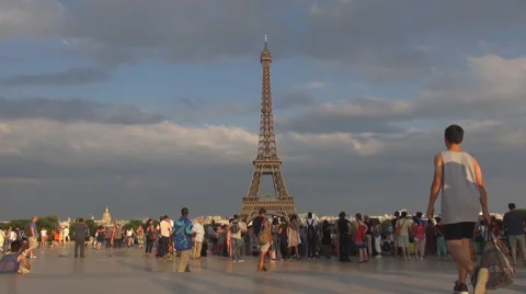 Amazing sunset at Eiffel Tower crowd of pedestrian people admire Paris panorama  Stock Footage 65614790