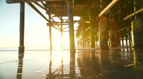 Amazing Sunset Light Flares Under Pier. Beach Sunset. 4K Stock Footage 61246654