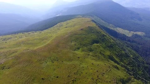 Amazing sunset lighting of mountain range.  aerial footage Video stock 79883450