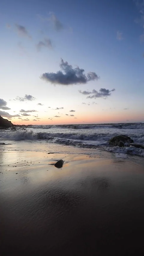 Amazing sunset over the beach. Vertical video Stock Footage 129631337