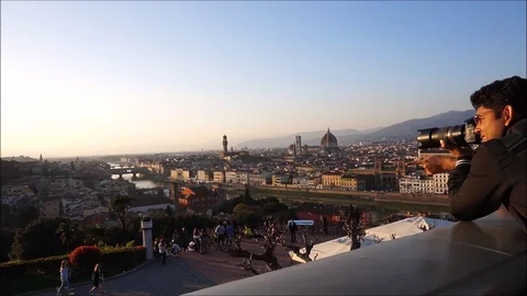 Amazing sunset panorama in Florence with photographer with tourists Stock Footage