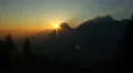 Amazing sunset, sun slowly hiding behind mountain time-lapse HD Footage