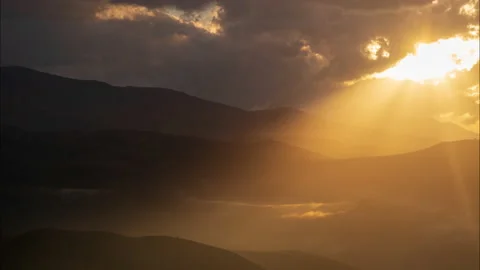 Amazing sunset with thick flowing clouds in the Caucasus mountains. Kabardino Stock Footage 143116744