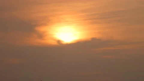 Amazing sunset through orange clouds timelapse Stock Footage 146810535