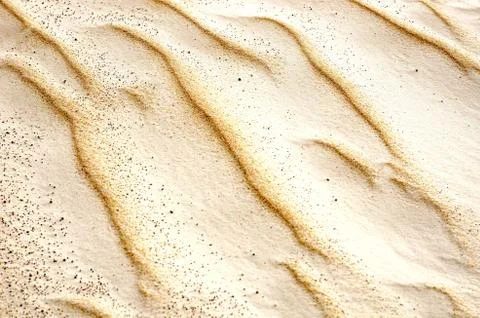 Amazing textured sand pattern can be used as background or wallpaper Фото