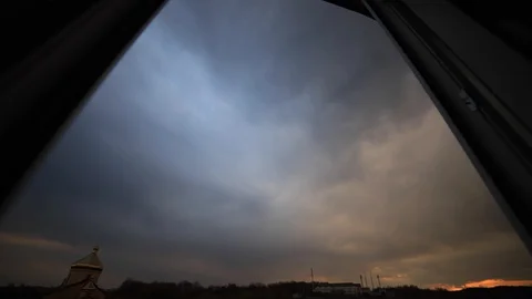 Amazing time lapse: beautiful magic multicolor clouds floating the sky Stock Footage 129635559