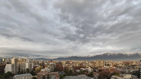An amazing time lapse of the clouds moving above Santiago city skyline and An Stock-Footage 147238701