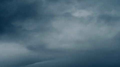 Amazing time-lapse of dramatic clouds, moving in diagonal of frame. Stock Footage 98094310