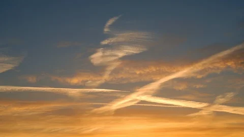 Amazing time-lapse of evening or morning sky with orange and yellow clouds. Stock Footage 98108595