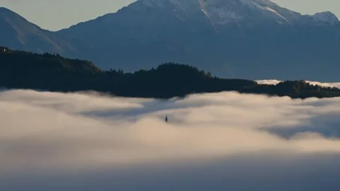 Amazing time lapse low inversion clouds moving in the valley, Slovenia Stock Footage 140802837