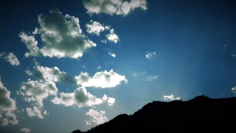 Amazing time lapse of sun rays moving over a darkened mountain in Arizona Stock Footage 73815243