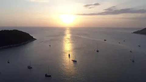 Amazing timelaps of tropical sunset under the sea. Yachts in the roadstead Stock Footage 76476382