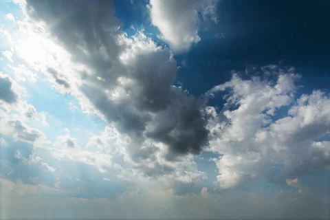 Amazing timelapse of white fluffy clouds moving across the sky. Stock Footage 132213877