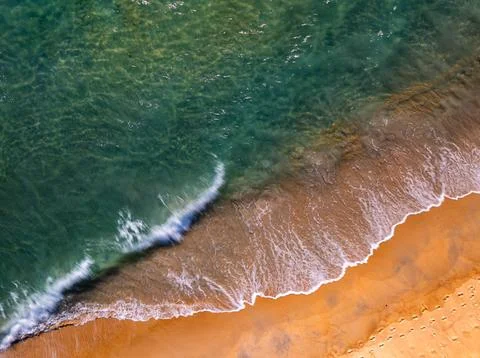 Amazing Top view dark sea beach landscape background,Summer sea waves crash.. Stock Photos