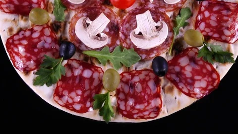 Amazing top view of pizza before baking close up, rotating clockwise Stock-Footage 84112554