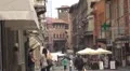 Amazing traditional street Old Town Bologna Italy medieval city urban shop busy HD Footage