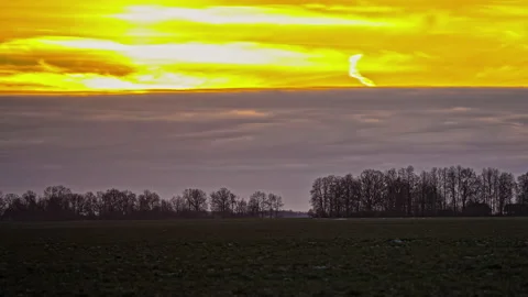 Amazing Triptych Timelapse Of Rolling Clouds Underneath Golden Yellow Stock Footage 227136956