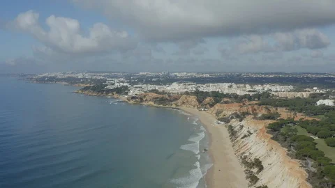 Amazing View From Above Of Sandy Beach With a City In The Background In Portugal Stock Footage 128832899