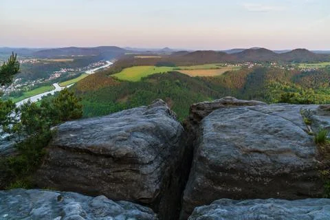 Amazing view across the cliff to a rustic style with green meadows Stock Photos