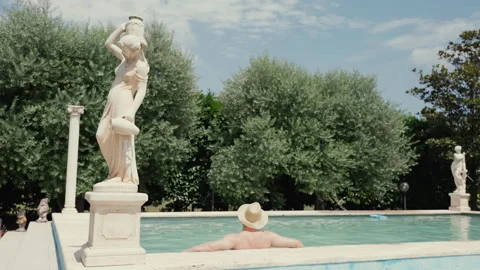 Amazing view of antique villa with growing olive trees and marble pool decorated Stock Footage 296965111