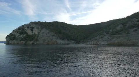 Amazing view of cliffs covered with forest on the shore, Krk Island Stock Footage 60737813