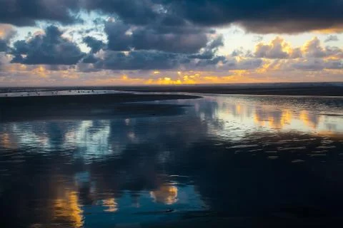 Amazing view of clouds reflected in the water Stock Photos
