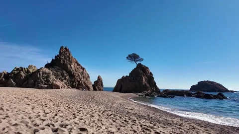 Amazing view to empty paradise beach and rocks, 4K Stock Footage 265521882