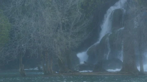 Amazing view of Kravice waterfall falling with speed seen through mist Stock Footage 60382936