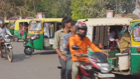Amazing view of motorbikes and auto rickshaws in Agra, India Stock Footage 101412073