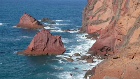 Amazing view over the ocean and beautiful brown and red colored rocks Stock Footage 171294566