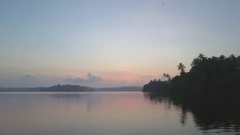 Amazing view over the water between natural islands sunrise ceylon drone footage Stock Footage 84923979