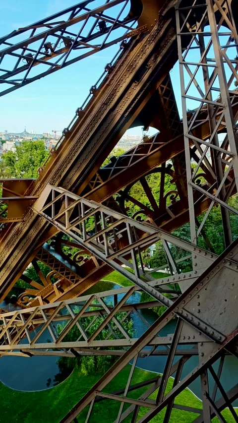 Amazing view of Paris city from ascending Eiffel tower lift. 4K vertical footage Stock Footage 282915948