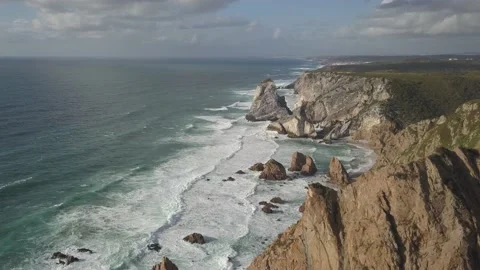 Amazing view of the rocks and blue waves of the Atlantic ocean at Cape ROCA Stock Footage 131863867