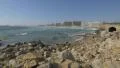 Amazing view of small waves crashing on rocks and Matosinhos beach, Porto 4k or 4k+ Resolution