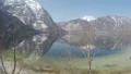 Amazing view of snowy Austrian Alps reflection in water, beautiful national park 4k or 4k+ Resolution